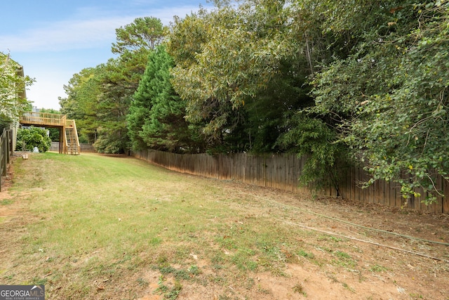 view of yard with a deck