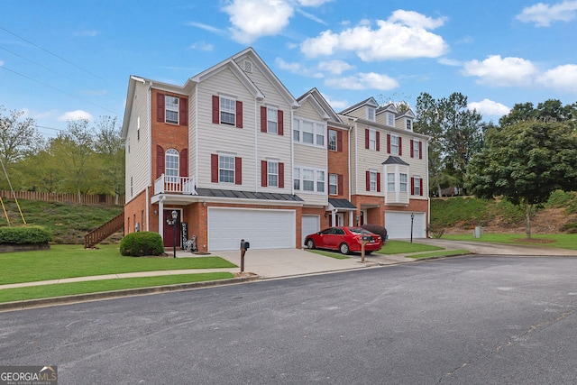 multi unit property featuring a garage