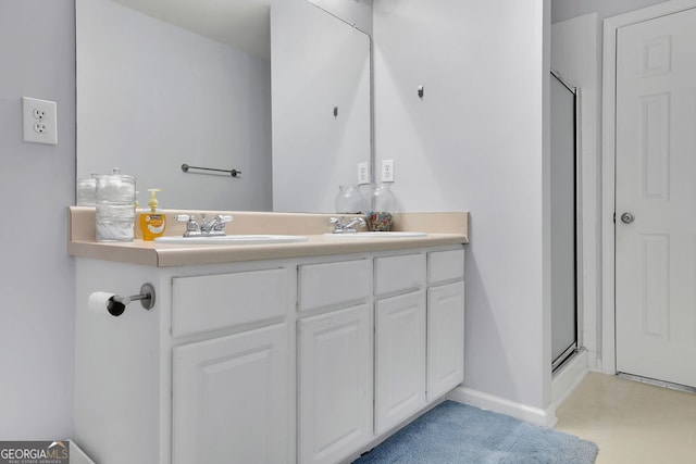 bathroom with an enclosed shower and vanity