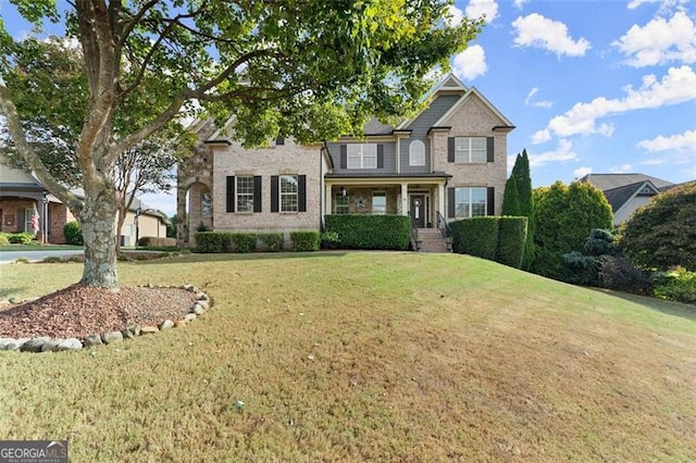 view of front of home with a front lawn