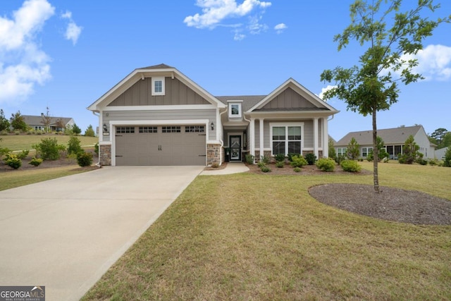 craftsman-style house with a garage and a front lawn