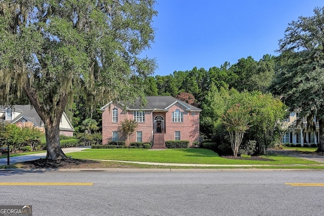 view of front of property with a front lawn