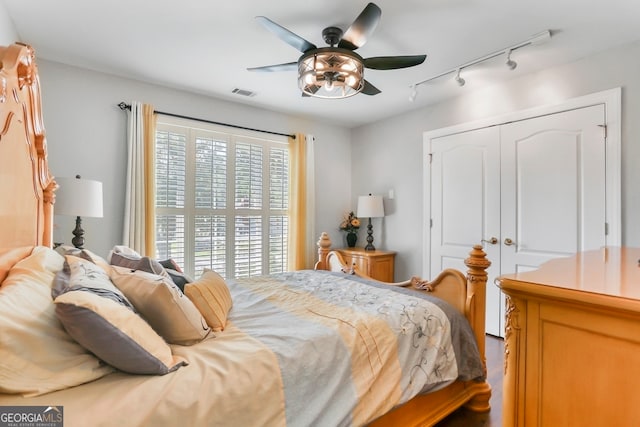 bedroom featuring a closet and ceiling fan