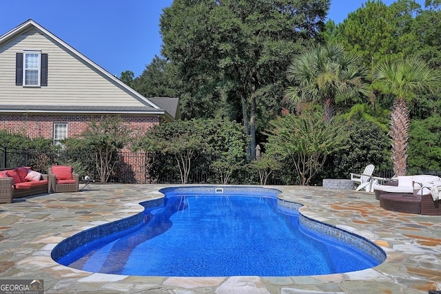 view of pool with a patio area