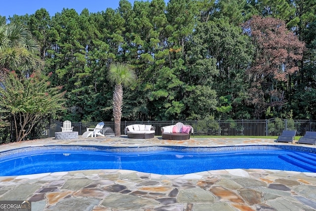 view of pool with a patio