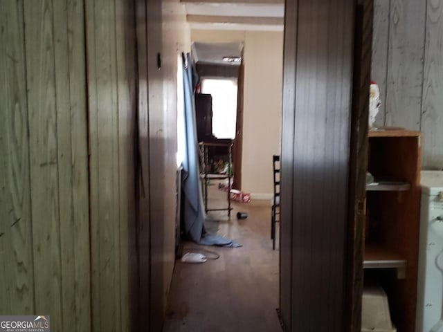 hallway with wooden walls