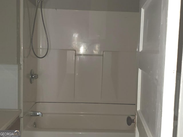 bathroom with shower / bathtub combination