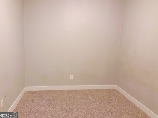 unfurnished room with carpet flooring