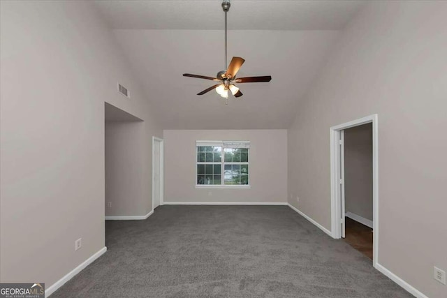 interior space with dark carpet, ceiling fan, and high vaulted ceiling