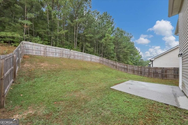 view of yard with a patio area