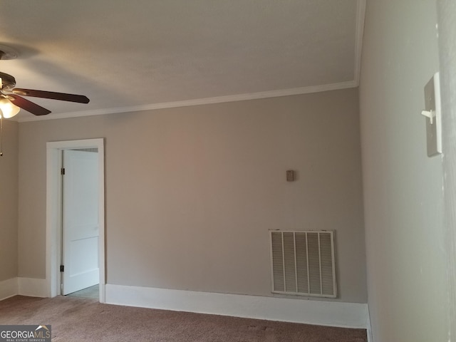 unfurnished room with carpet flooring, ceiling fan, and ornamental molding