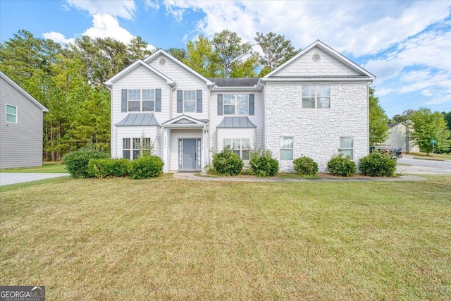 front of property with a front lawn