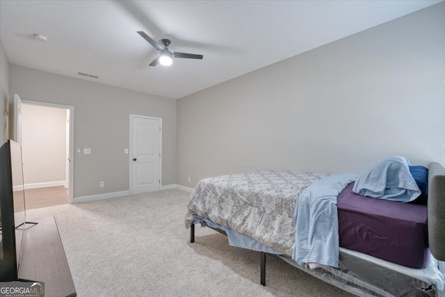 bedroom featuring ceiling fan and carpet flooring