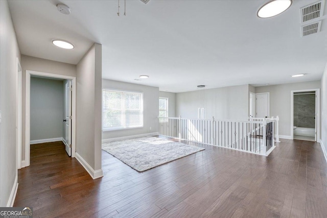 foyer entrance with dark hardwood / wood-style floors