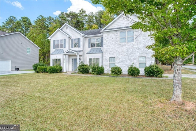 view of front facade featuring a front lawn