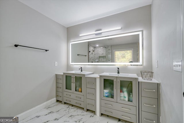 bathroom with vanity and an enclosed shower