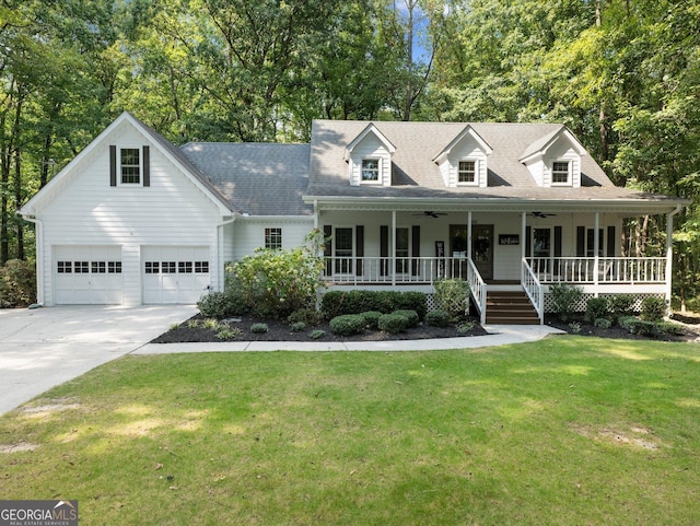 cape cod home with a porch, a garage, and a front yard