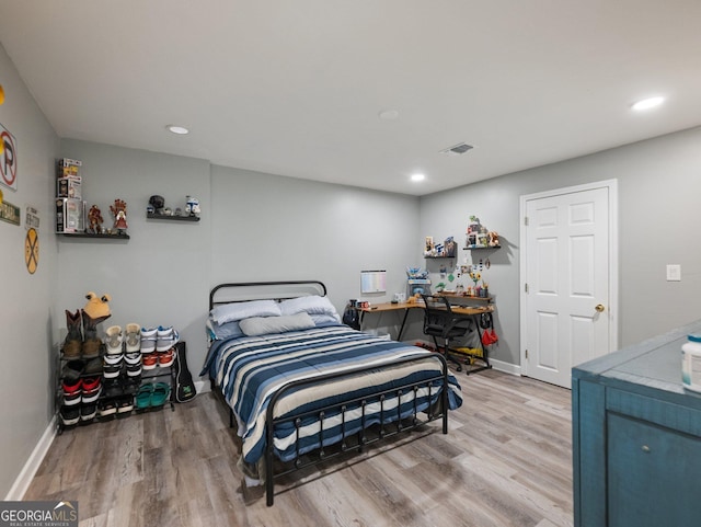 bedroom with wood-type flooring