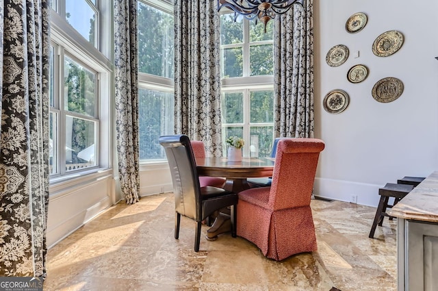 9620 Cedar Grove Rd, Fairburn, GA 30213 - dining space with light stone finish floors