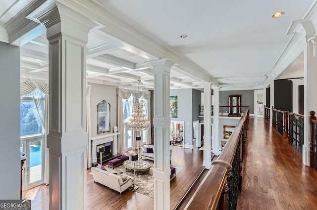 9620 Cedar Grove Rd, Fairburn, GA 30213 - hallway with ornate columns, healthy amount of natural light, beamed ceiling, a chandelier, and coffered ceiling