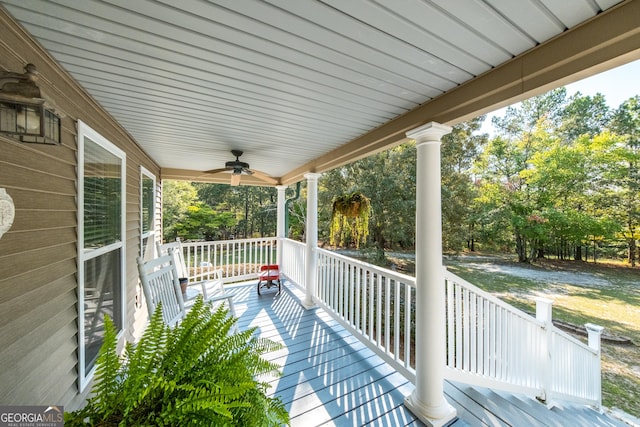 deck featuring a porch and ceiling fan