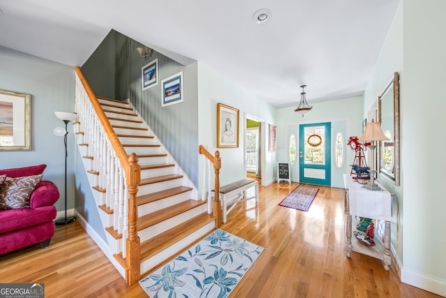 foyer with hardwood / wood-style flooring