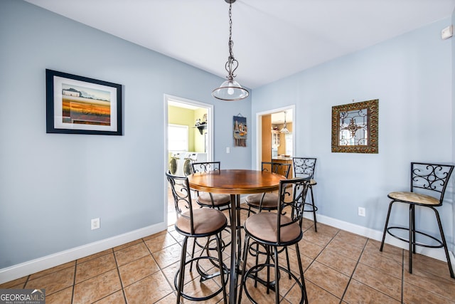 dining room with light tile patterned floors