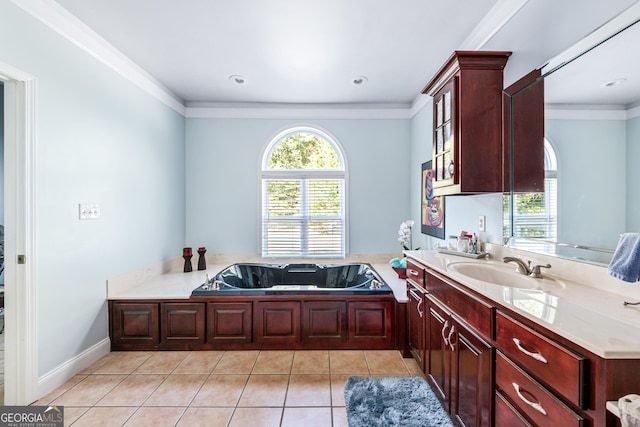 bathroom featuring a washtub, vanity, crown molding, and tile patterned flooring