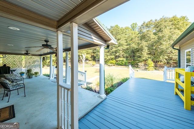 exterior space featuring ceiling fan