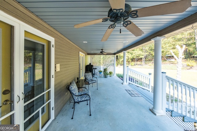 view of patio featuring ceiling fan and covered porch