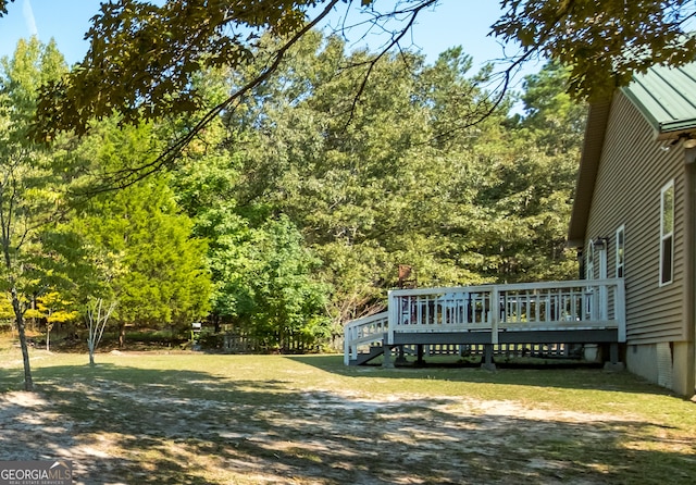 view of yard featuring a wooden deck