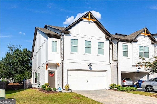 view of front facade featuring a front yard and a garage