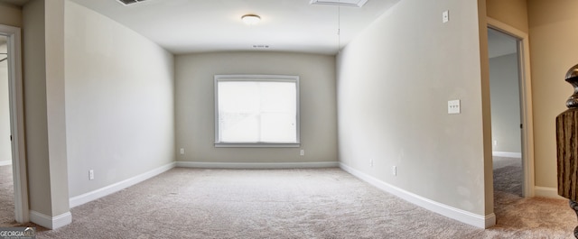 view of carpeted spare room