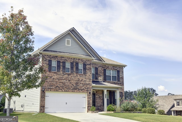 view of front of home with a garage, central AC unit, and a front lawn