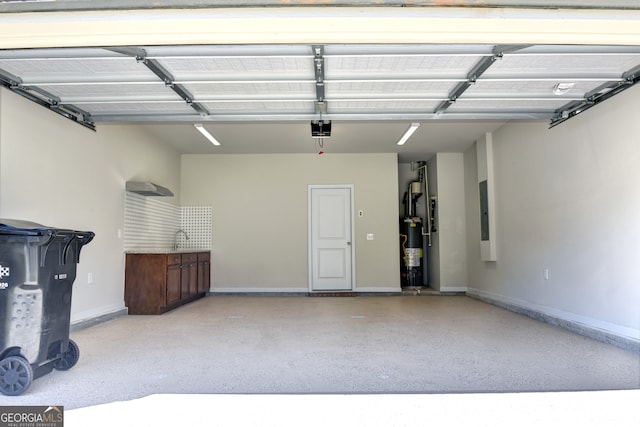 garage featuring a garage door opener and gas water heater