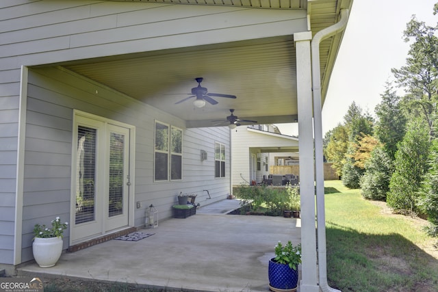 view of patio featuring ceiling fan