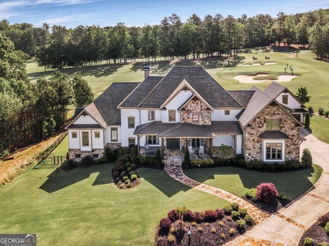 view of front of property with a front lawn