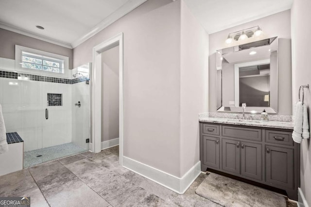 bathroom featuring crown molding, a shower with door, and vanity