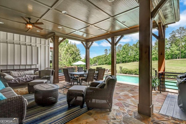 view of patio / terrace featuring an outdoor living space and ceiling fan