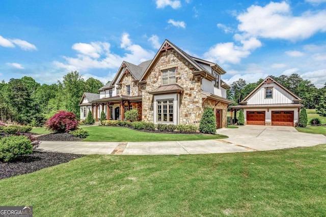 view of front of home featuring a front lawn and a garage