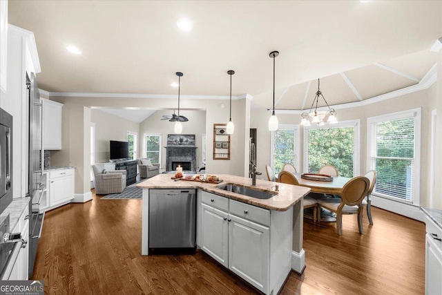 kitchen with dishwasher, a center island with sink, white cabinets, and lofted ceiling