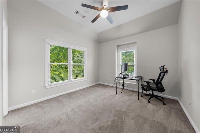 office with ceiling fan, light carpet, and vaulted ceiling