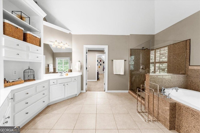 bathroom with vanity, tile patterned floors, independent shower and bath, and crown molding