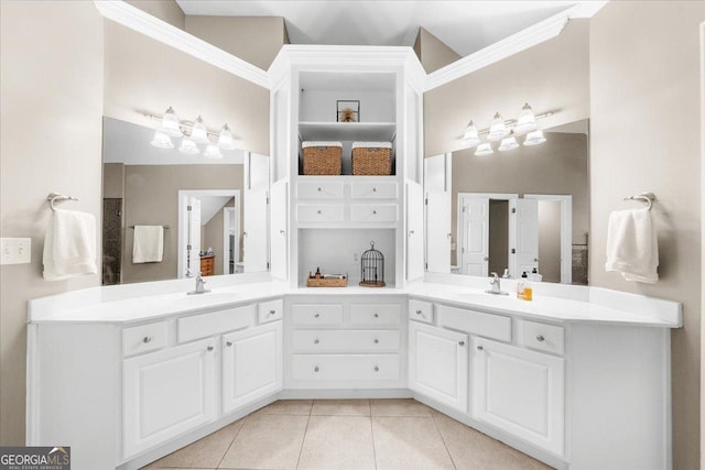 bathroom with tile patterned flooring and vanity