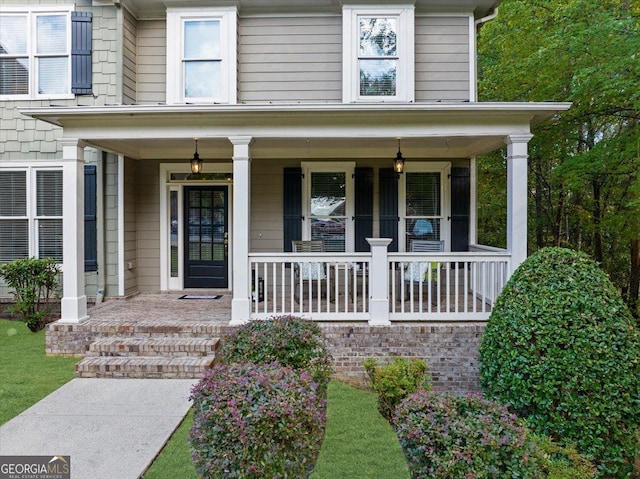 entrance to property with a porch