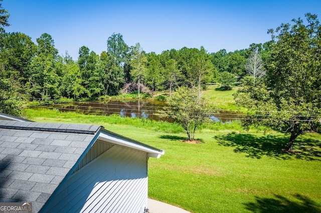 view of yard with a water view