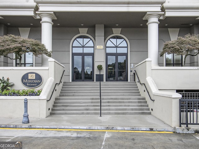 property entrance featuring french doors