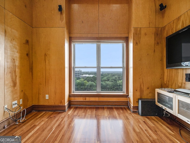 unfurnished living room featuring light hardwood / wood-style flooring