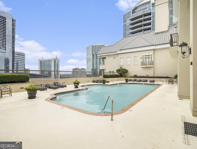 view of pool with a patio