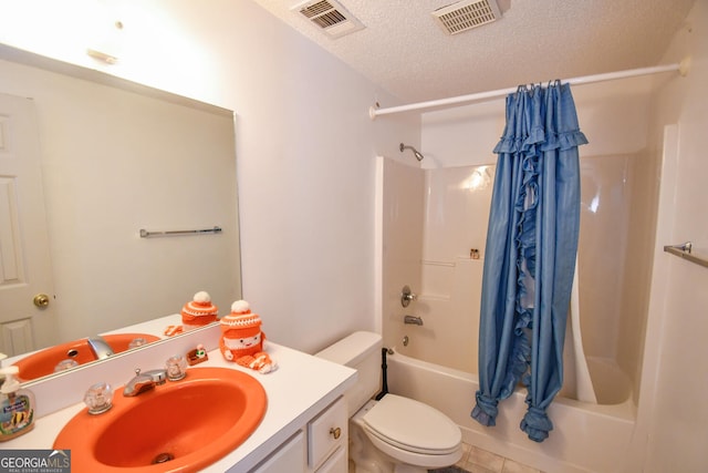 full bathroom with shower / bath combination with curtain, a textured ceiling, tile patterned floors, vanity, and toilet